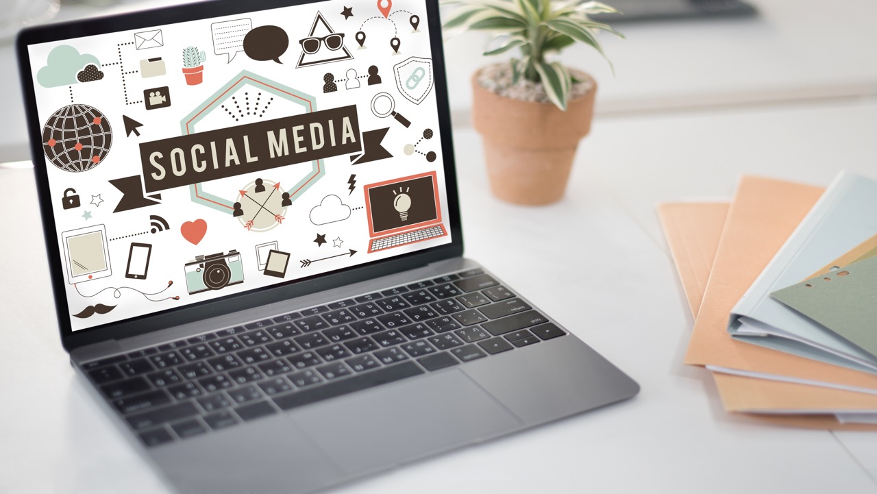 Social media marketing concept displayed on laptop screen